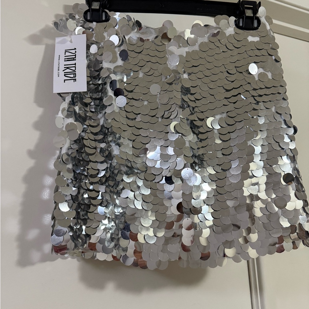 Silver skirt 
12th Tribe
Size xs-s